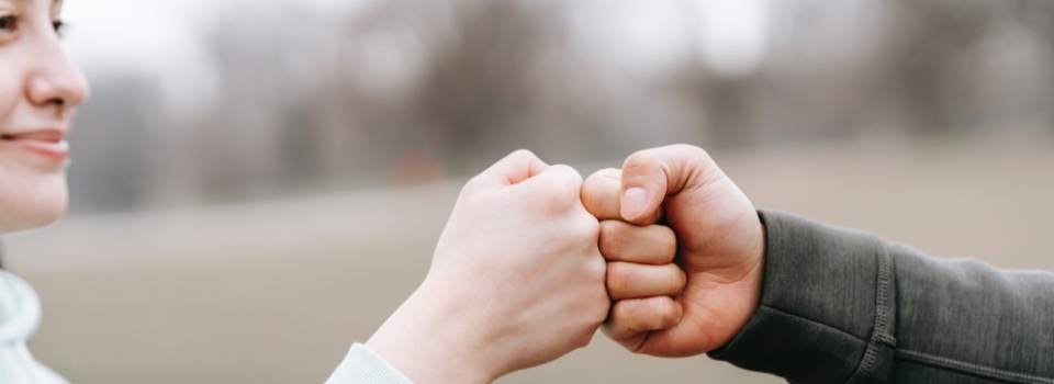 a close up of two hands